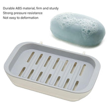 Adhesive soap holder tray for water drainage in the bathroom