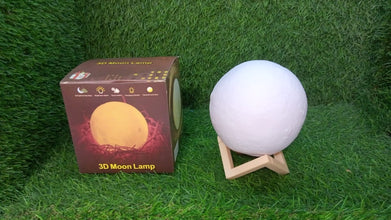 Moon lamp with stand and USB charging, ideal for bedroom lighting.