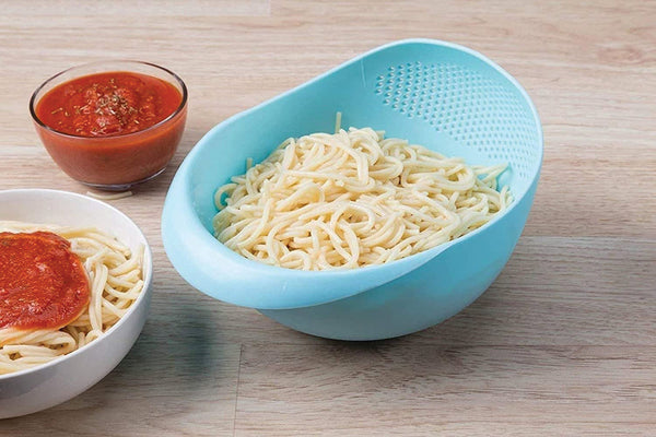 Large plastic rice bowl strainer, ideal for washing and storing grains.